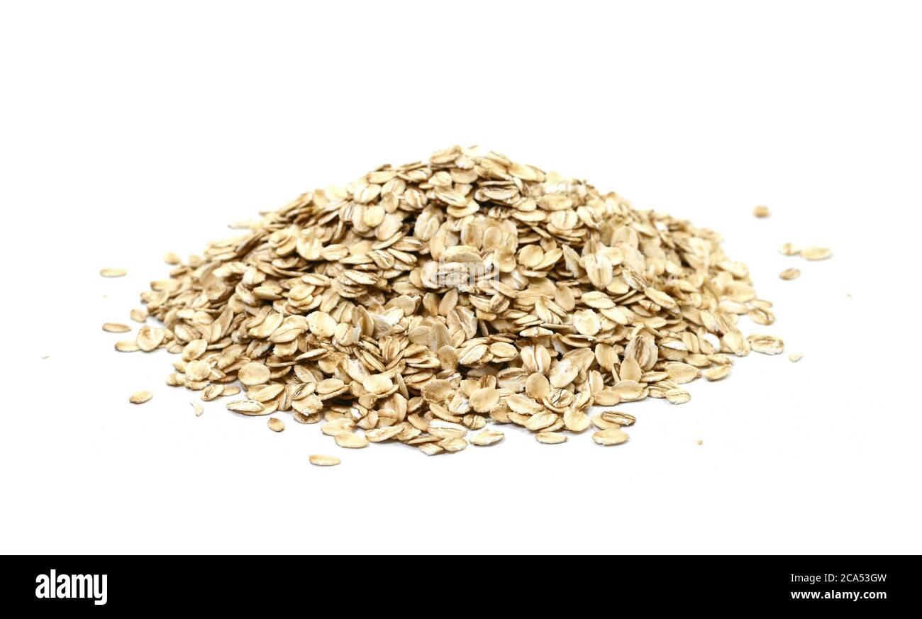 Oat Rocks Oat flakes pile isolated on white background Stock Photo - Alamy