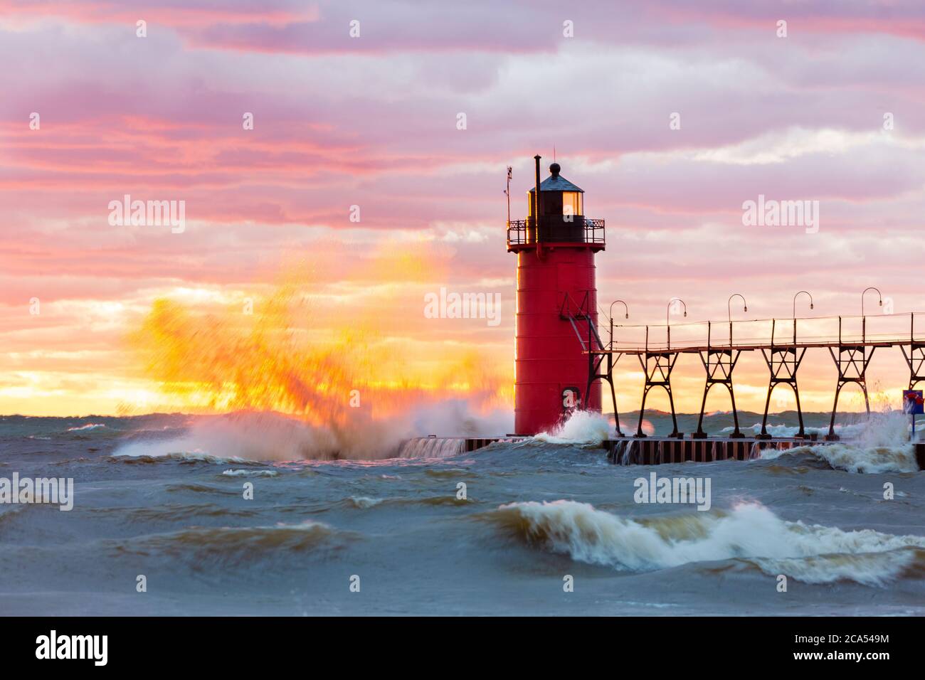 View of waves strikes on lighthouse, South Haven, Michigan, USA Stock Photo