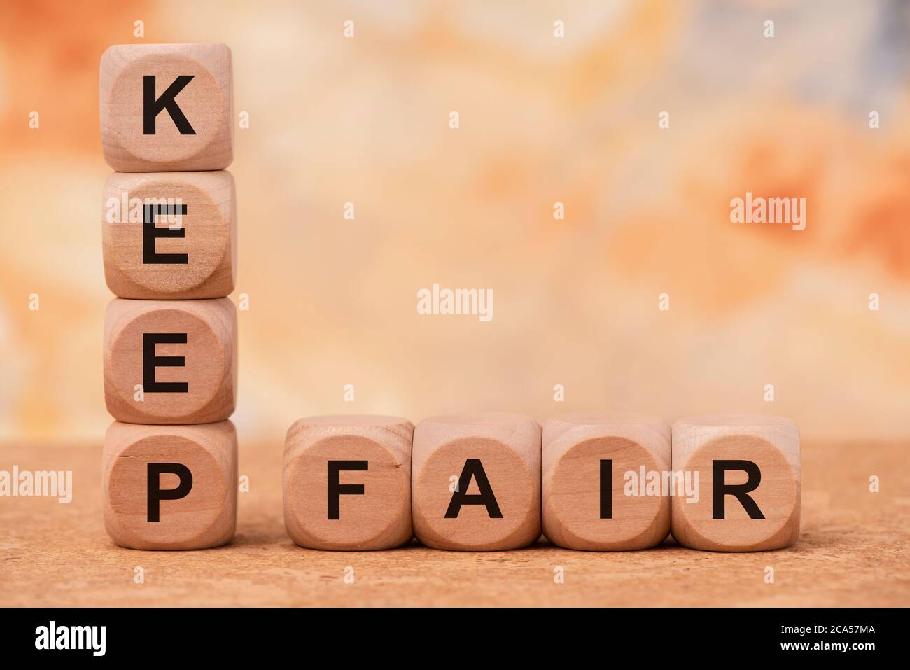 keep fair printed on wooden cubes Stock Photo