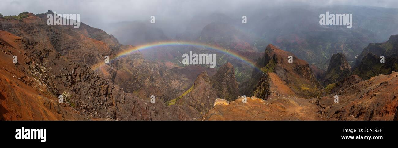 Rainbow over Waimea Canyon, Kauai, Hawaii, USA Stock Photo