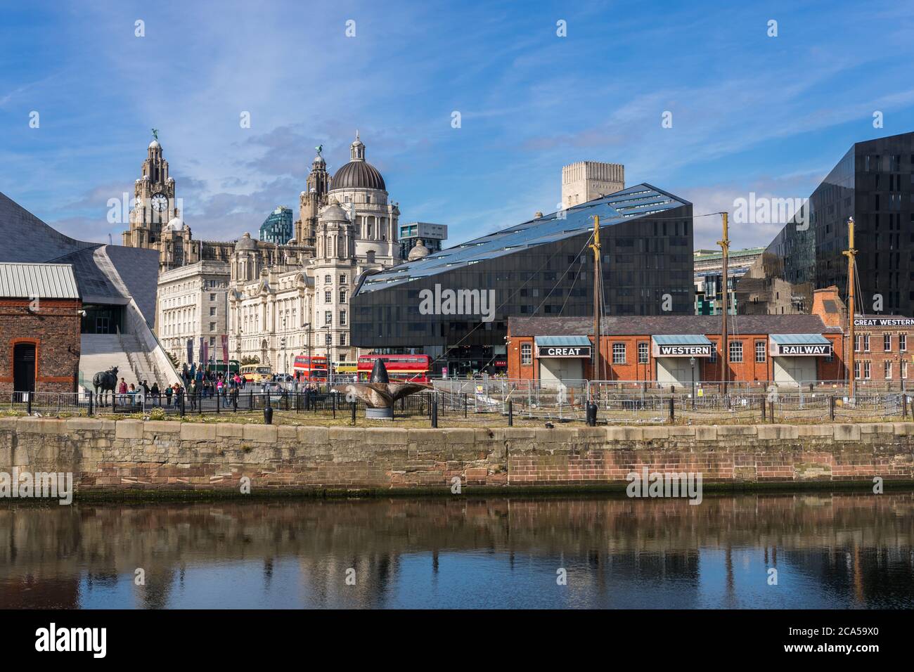 Liverpool waterfront with the Great Western Railway building and the Three Graces in the background, Liverpool, UK Stock Photo