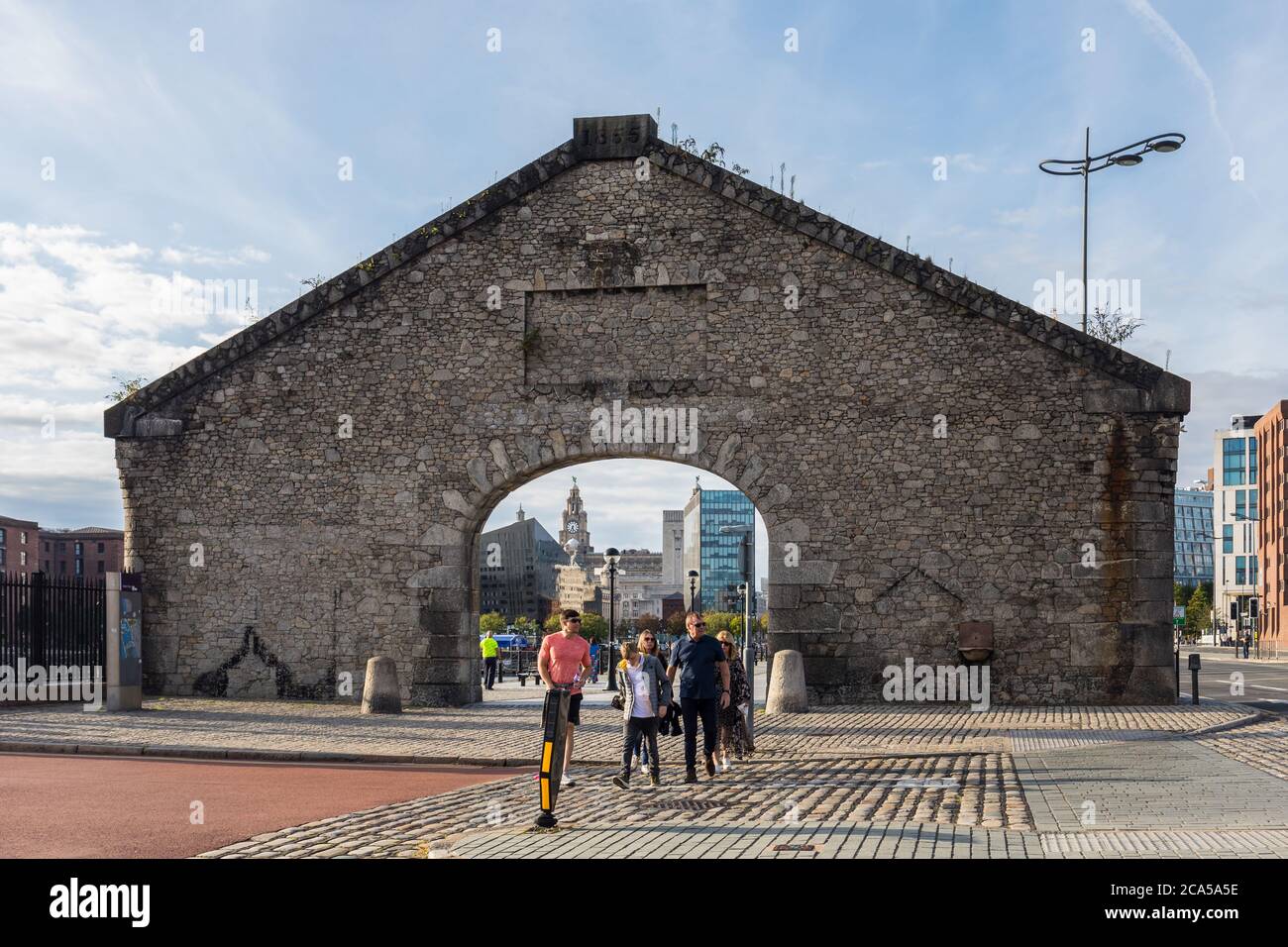 A granite stone gable and arch entrance to Salthouse Dock, Liverpool, Merseyside, United Kingdom Stock Photo