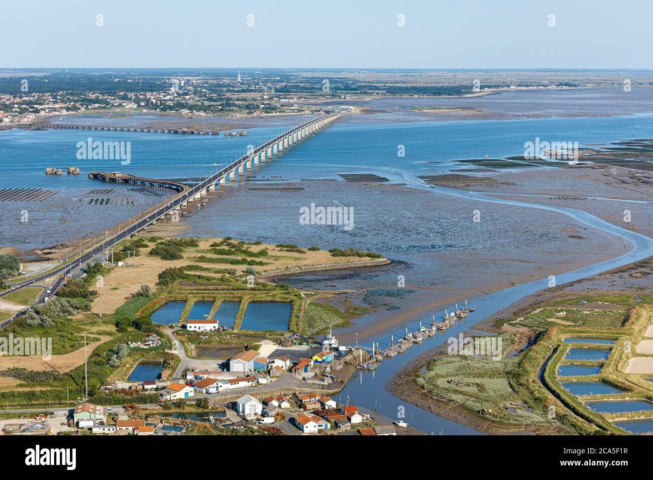 France, Charente Maritime, Le Chateau d'Oleron, Ors canal and the bridge (aerial view) Stock Photo