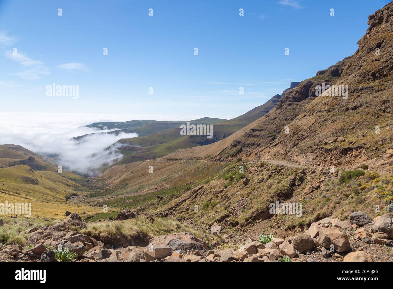 Over the clouds on Sani Pass from Lesotho to South Africa, Stock Photo