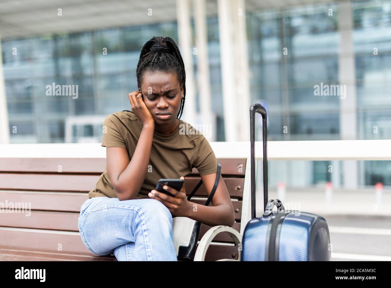 Black person airport sad hi-res stock photography and images - Alamy