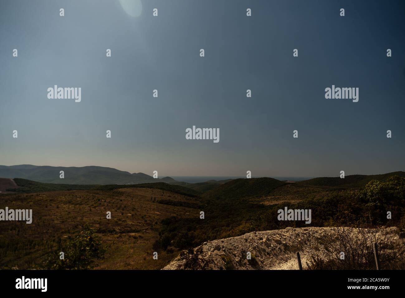 A sign on the side of a mountain Stock Photo