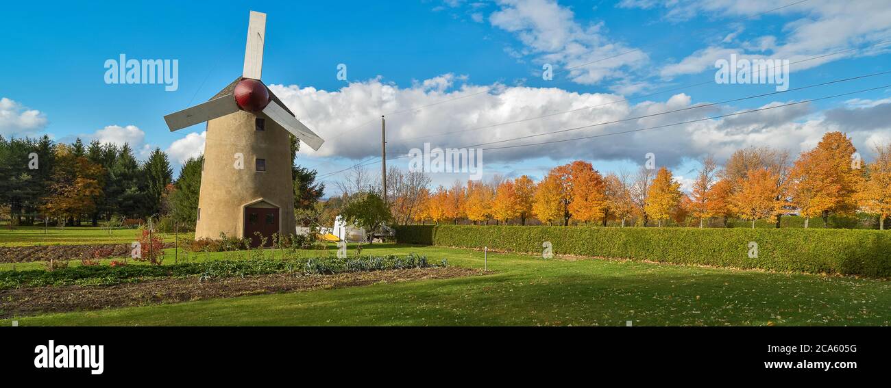 Old windmill in autumn, Ile d Orleans, Quebec Province, Canada Stock Photo