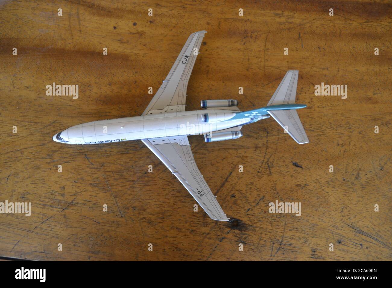 Commercial aircraft. Scale plastic model of commercial aircraft used in Brazil, top view, with wooden bottom, Brazil, South America Stock Photo