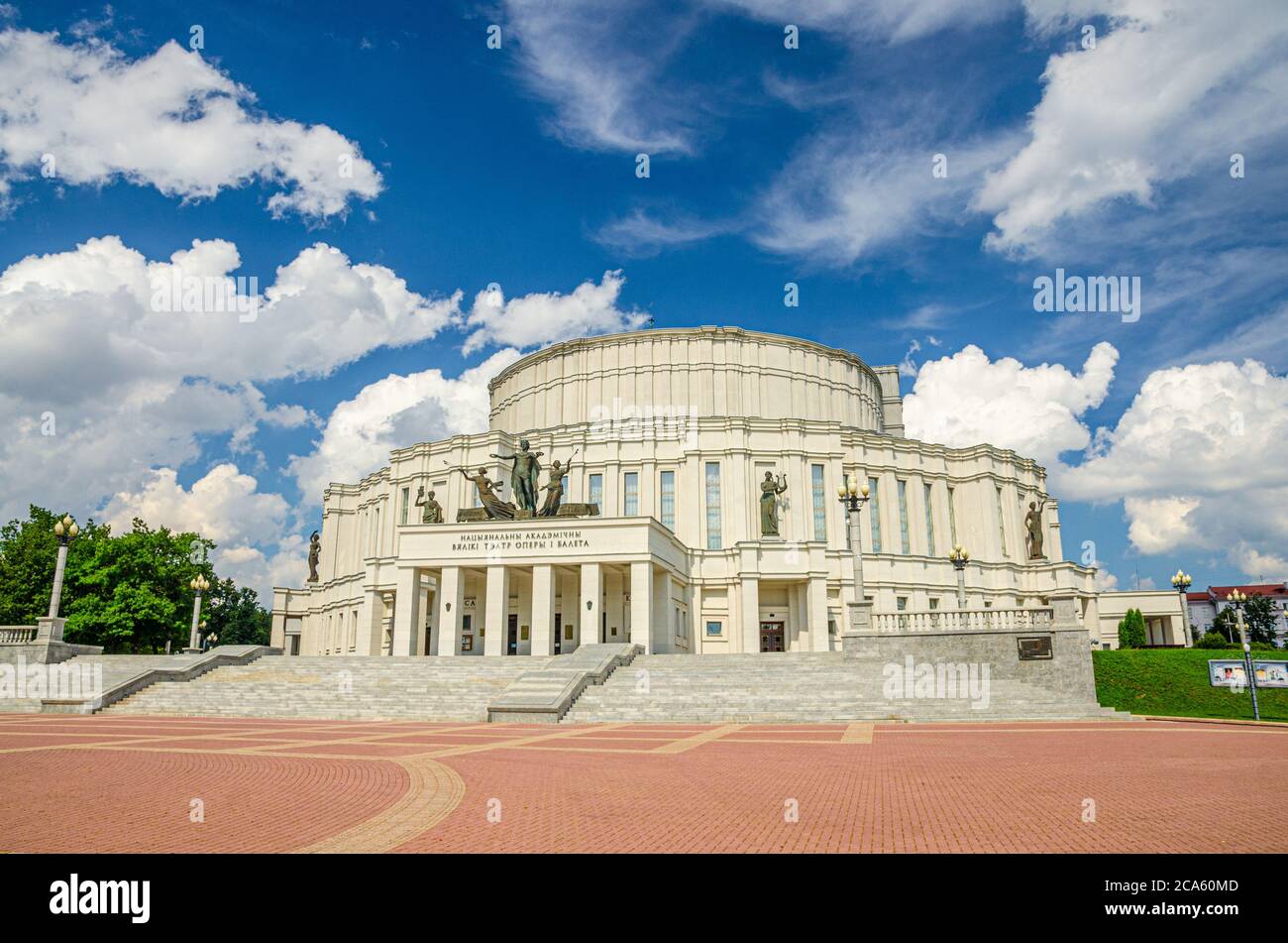 Minsk, Belarus, July 26, 2020: The National Academic Grand Opera and Ballet Theatre building in park in Trinity Hill district of historical city centre, blue sky white clouds in sunny summer day Stock Photo