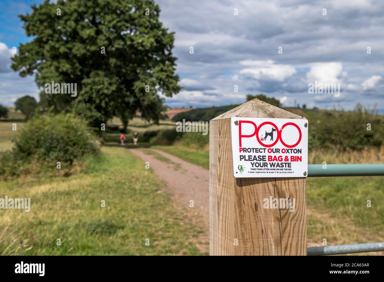 Please bag and bin sign on a English country lane, Stock Photo