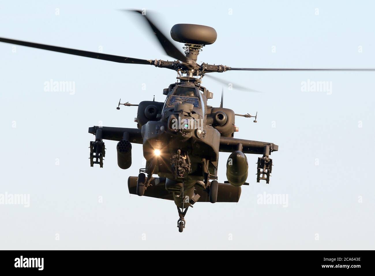 Army Air Corps Apache attack helicopter in the hover over Wattisham airfield, Suffolk. Stock Photo