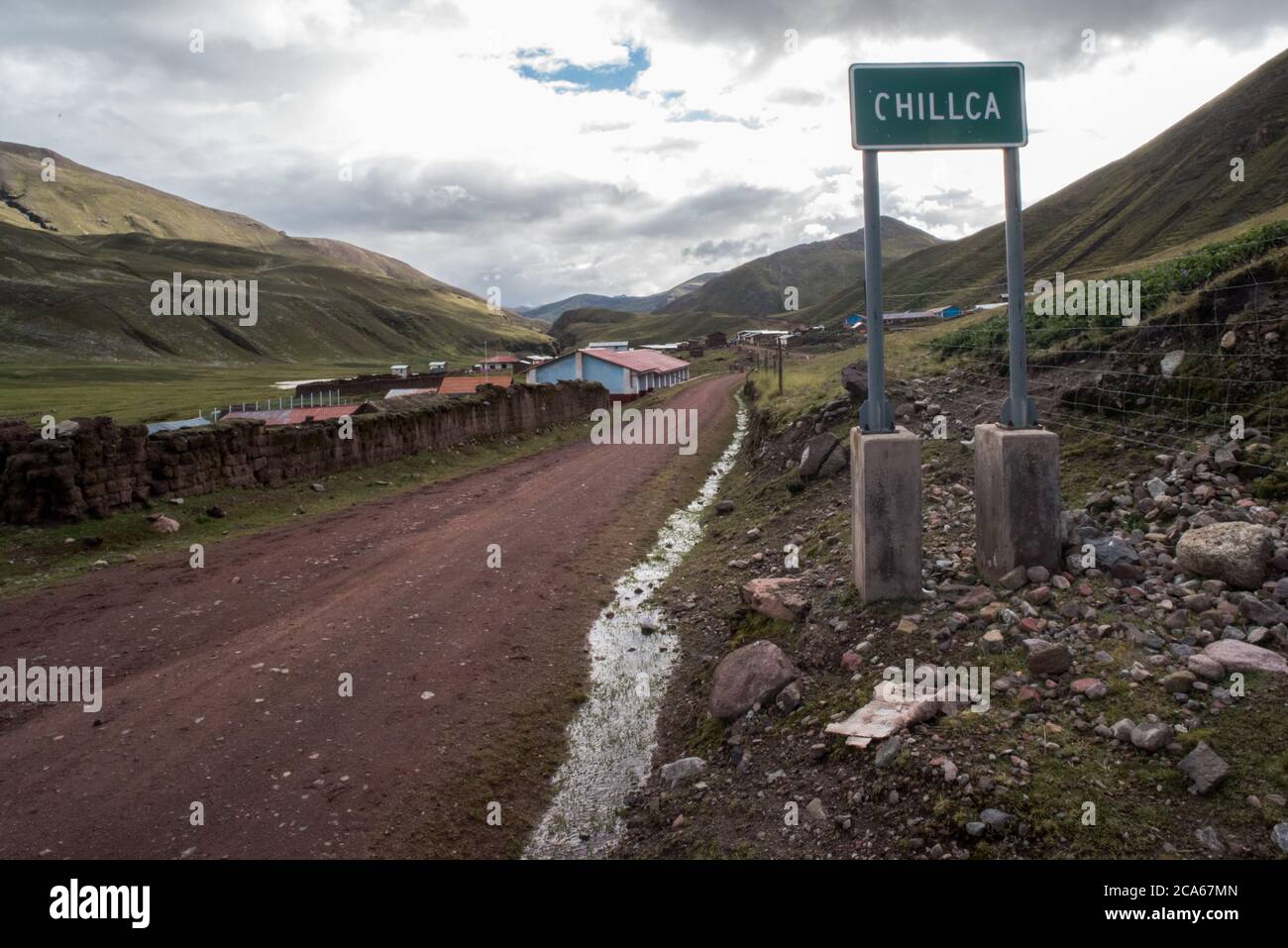 A sign shows the edge of Chillca, a small Andean town nestled in the Andes Mountains of Southern Peru. Stock Photo