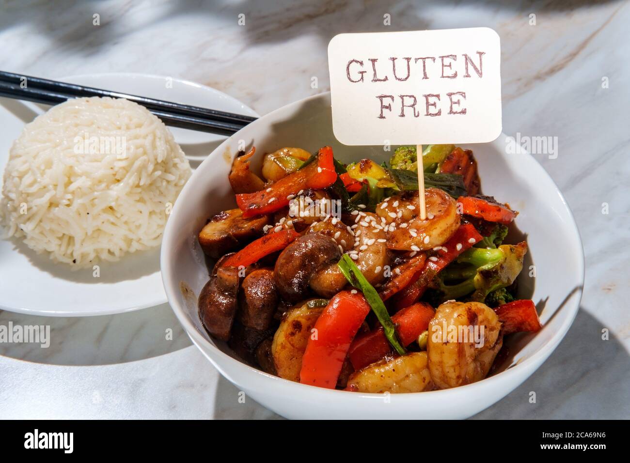 Chinese shrimp with mixed sauteed vegetables in a brown garlic sauce