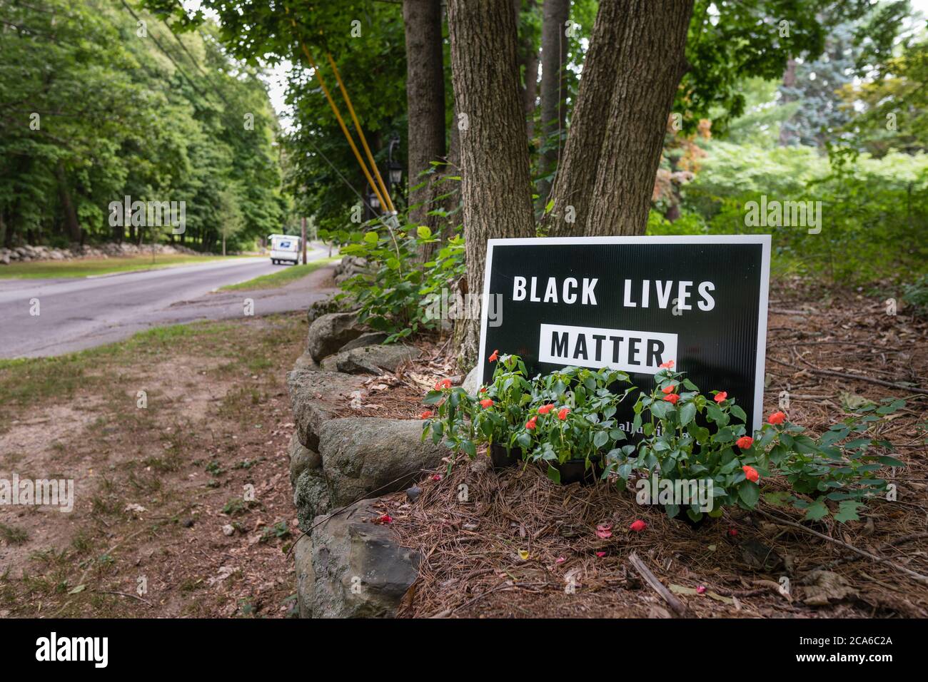 Close-up of Black Lives Matter sign on suburban street Stock Photo