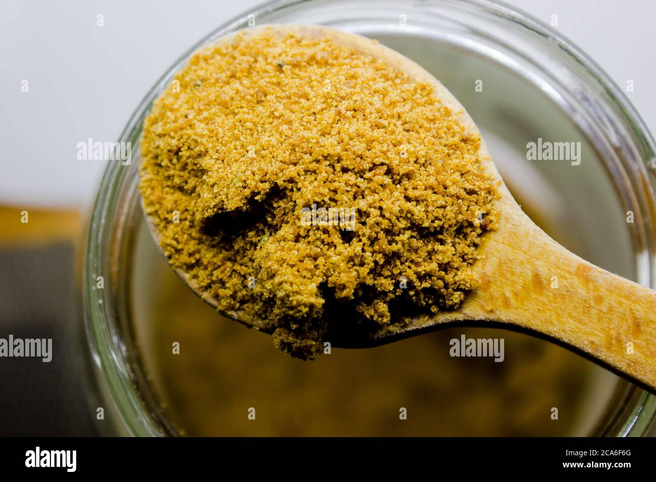Coconut sugar is a palm sugar produced from the sap of the flower bud stem of the coconut palm alternative to white sugar Stock Photo