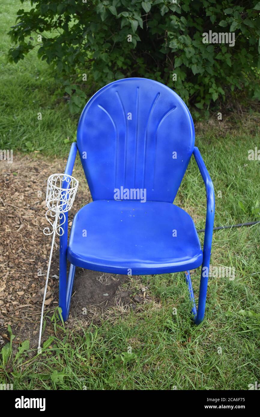 Blue Lawn Chair in a Yard Stock Photo Alamy