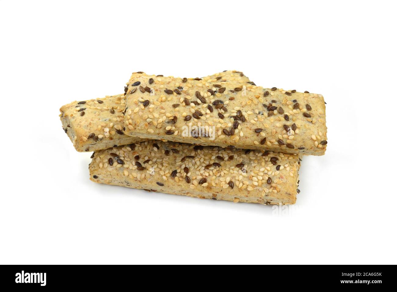 Breadsticks or grissini with sesame and linseed isolated on white