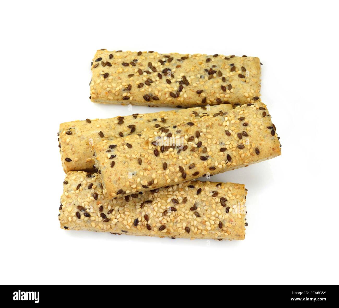 Breadsticks or grissini with sesame and linseed isolated on white
