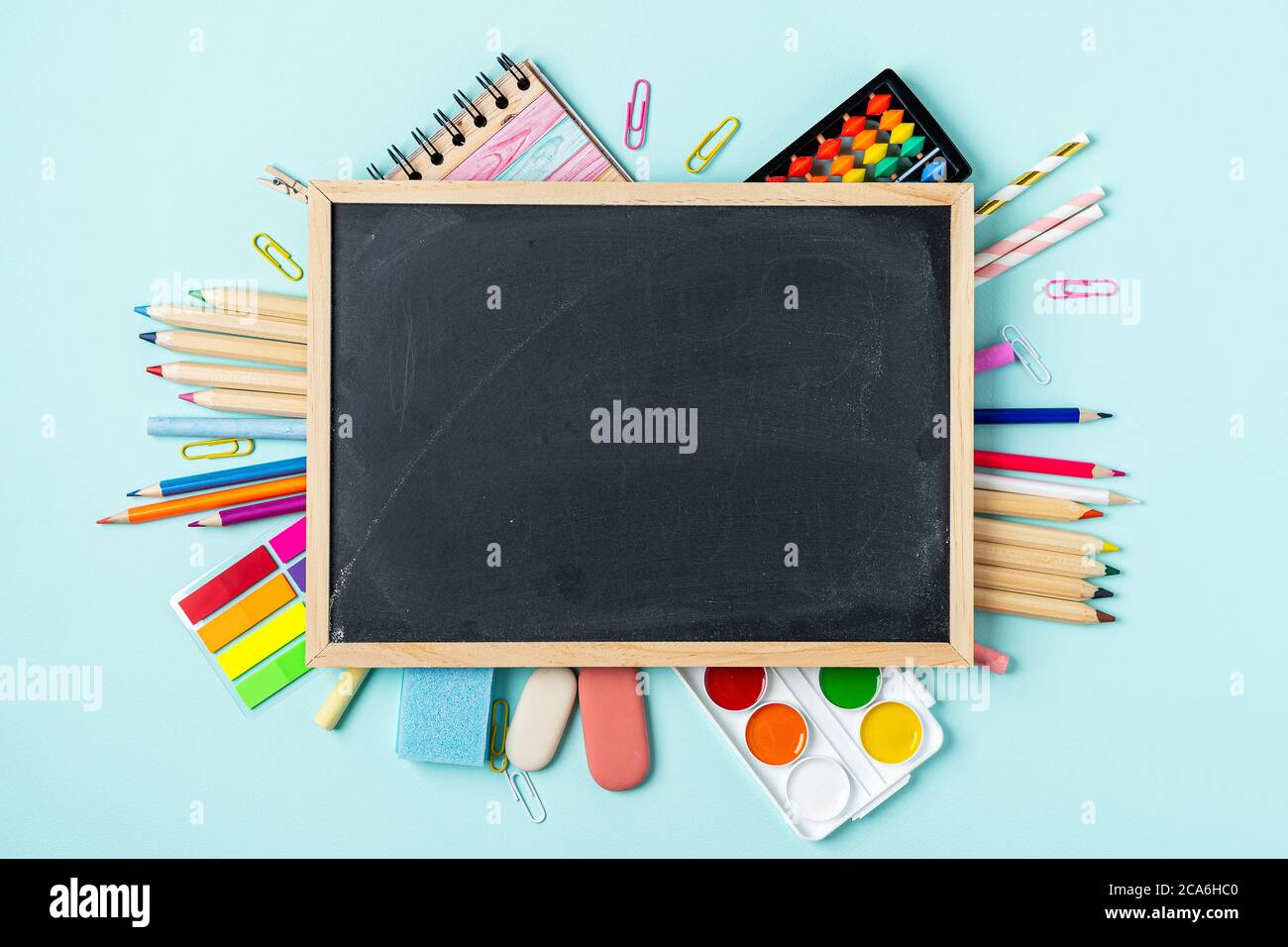 Education or back to school Concept. glasses, pencils, note books, chalk,  eraser over chalkboard background Stock Photo - Alamy