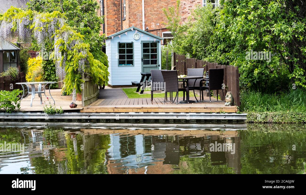 Canal side decking and seating area Stock Photo