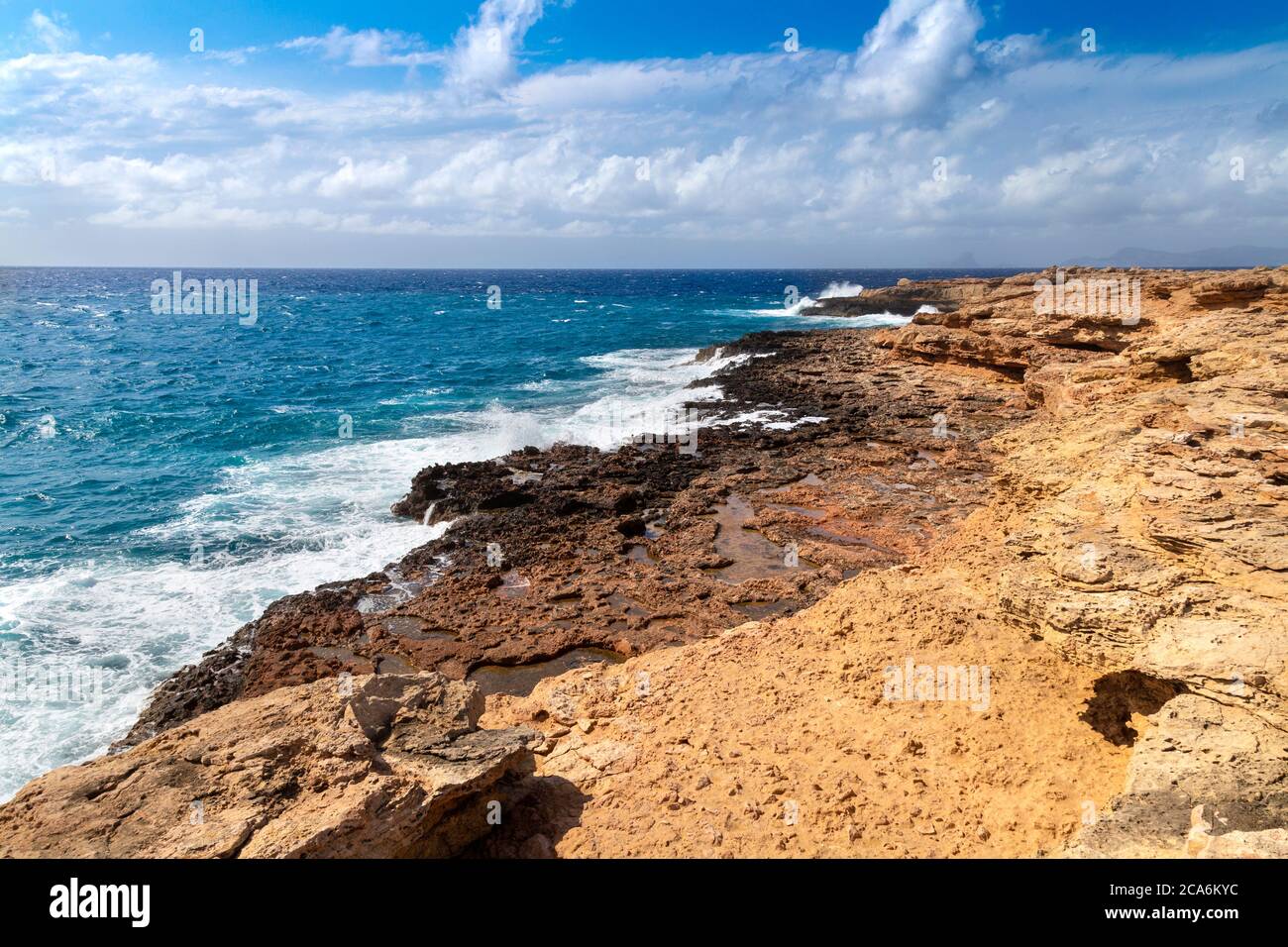 Sharp rocky coastline of Can Marroig, Formentera, Spain Stock Photo