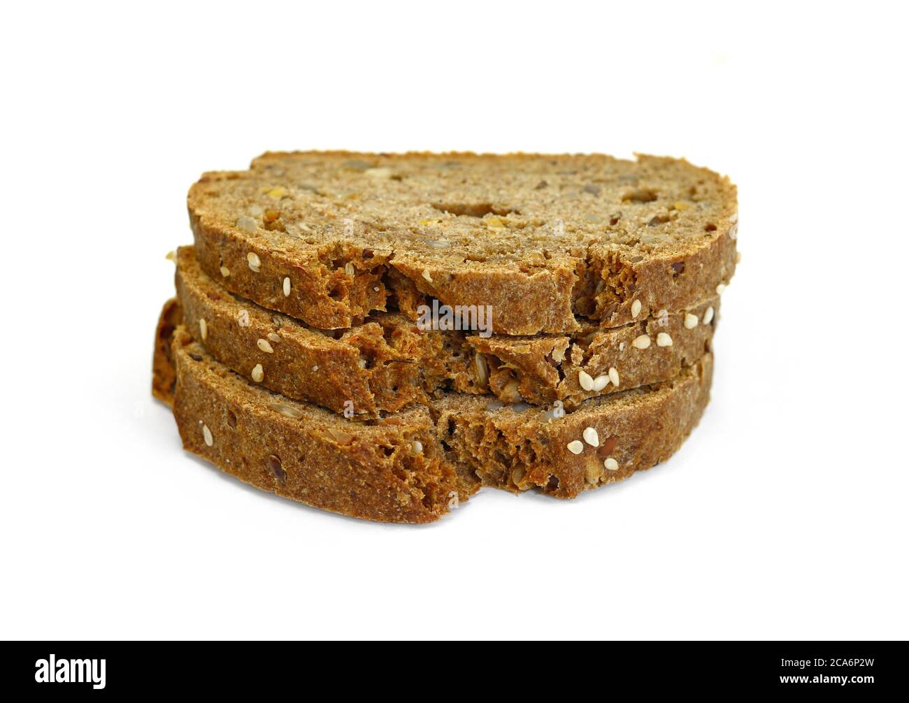 slices of black bread with pumpkin seed and sesame isolated on white ...