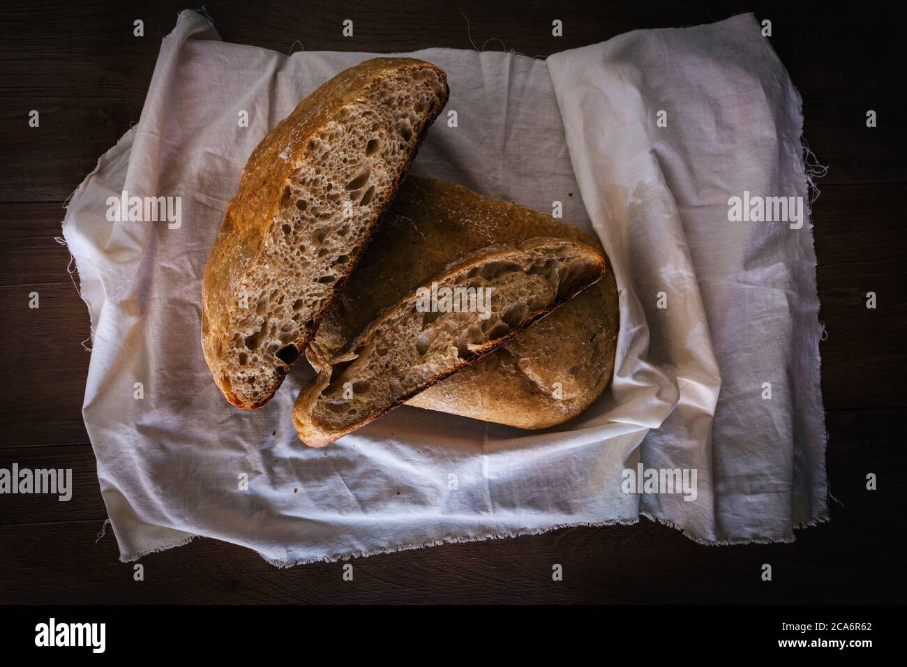 Artisan Bread Loaf On Kitchen Cloth On Rustic Wooden Table Background Bread Made With Fruit Yeast Water Natural Fermentation Stock Photo Alamy