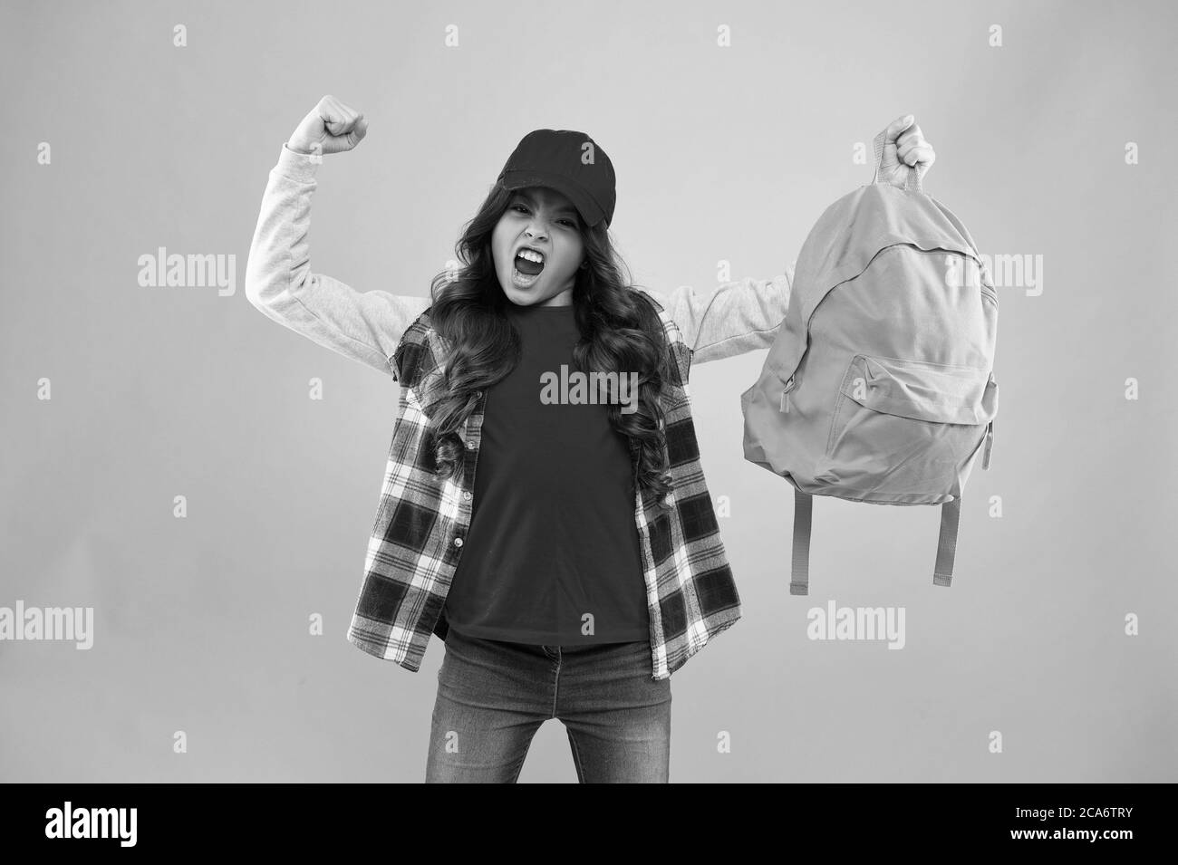 Powerful kid. Carrying things in backpack. Learn how fit backpack