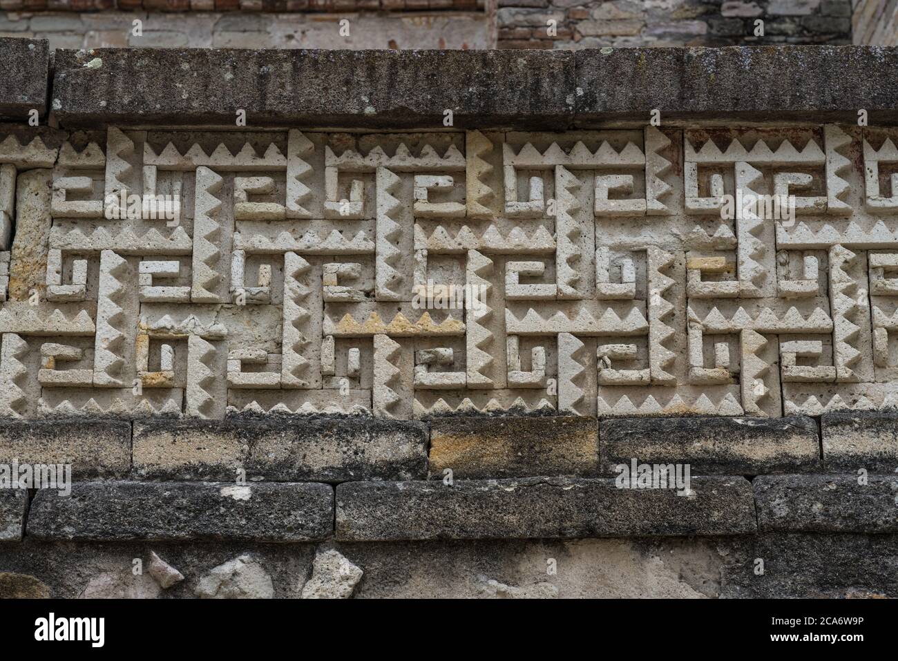 Detail of the stone fretwork panels  in Courtyard B (Quadrangle B) the ruins of the Zapotec city of Mitla, Oaxaca, Mexico.  A UNESCO World Heritage si Stock Photo