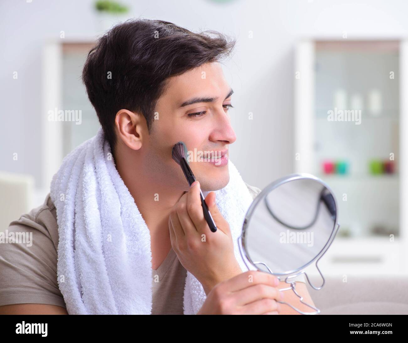 Man peeling off mask hi-res stock photography and images - Alamy