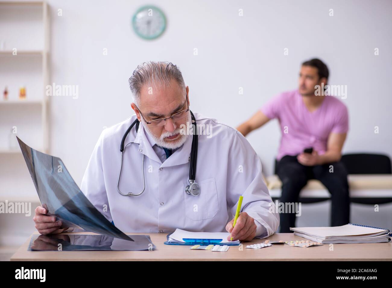 Radiologist taking x ray patient hi-res stock photography and images ...