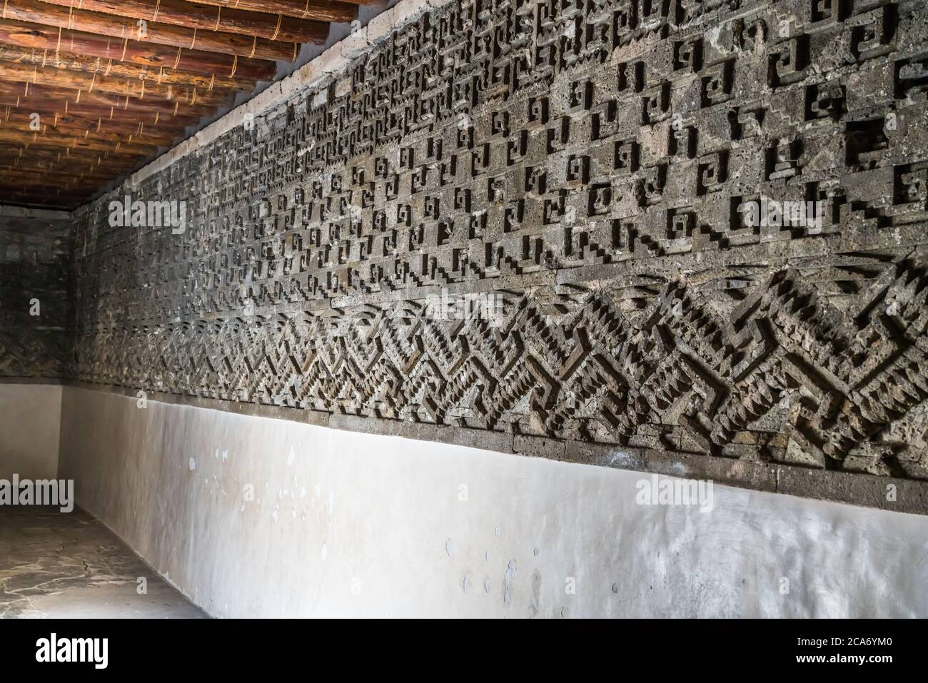 Stone fretwork friezes inside a room in the Palace, Building 7,  in the ruins of the Zapotec city of Mitla in Oaxaca, Mexico.  A UNESCO World Heritage Stock Photo