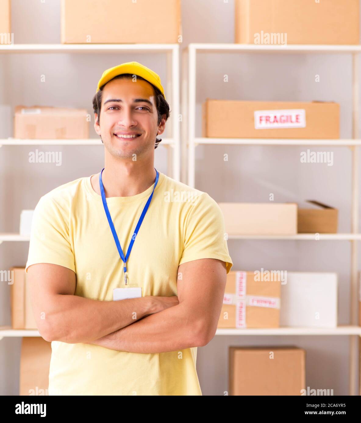 The handsome contractor working in box delivery relocation service Stock Photo Alamy