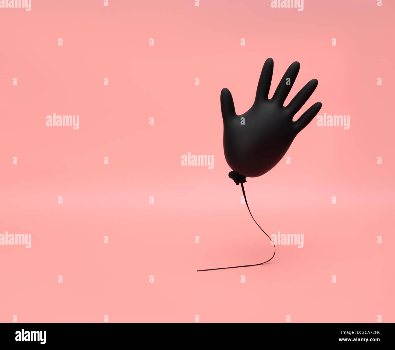 Black inflated flying rubber glove on a pink background. Prevention and protection against coronavirus, covid-19. Minimal medicine concept. Copy space Stock Photo