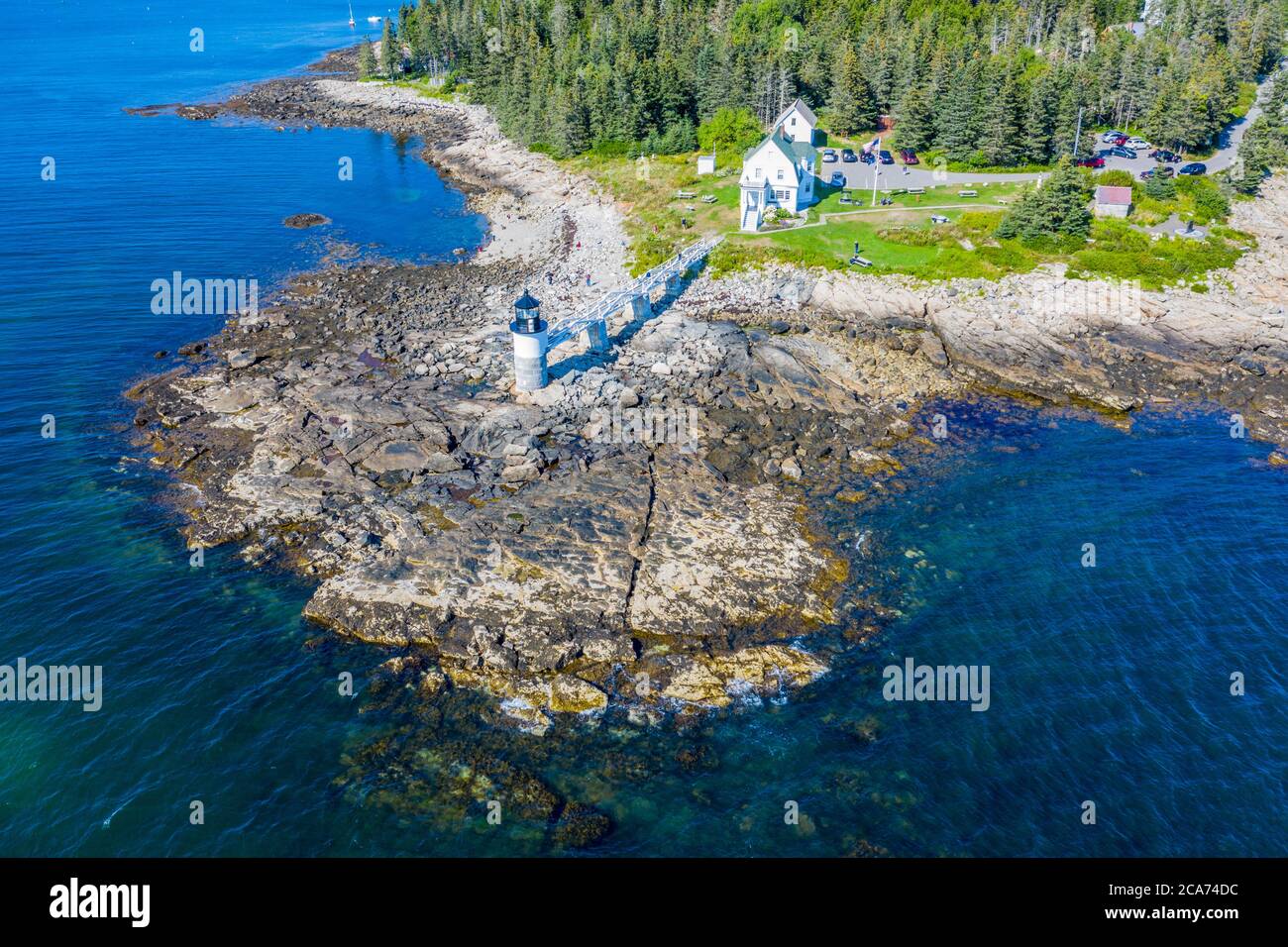 Aerial view of Marshall Point Light Station, a lighthouse at the entrance of Port Clyde Harbor in Port Clyde, Maine. Stock Photo
