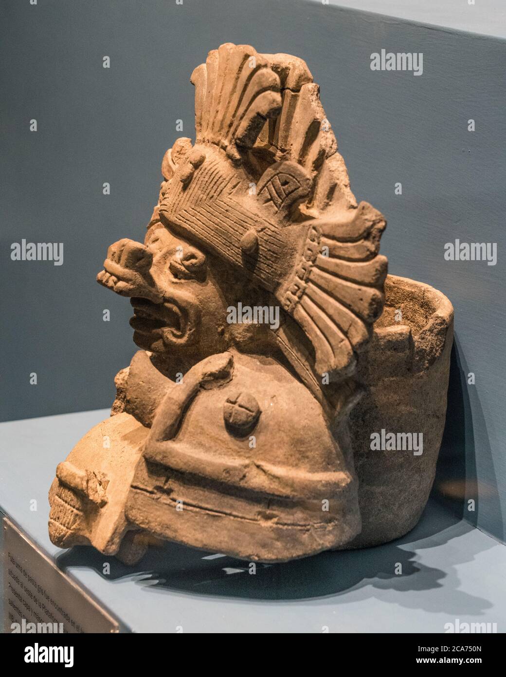 A ceramic funerary urn representing Cocijo, the Zapotec god of rain and lightning.  Monte Alban Site Museum, Oaxaca, Mexico.  A UNESCO World Heritage Stock Photo