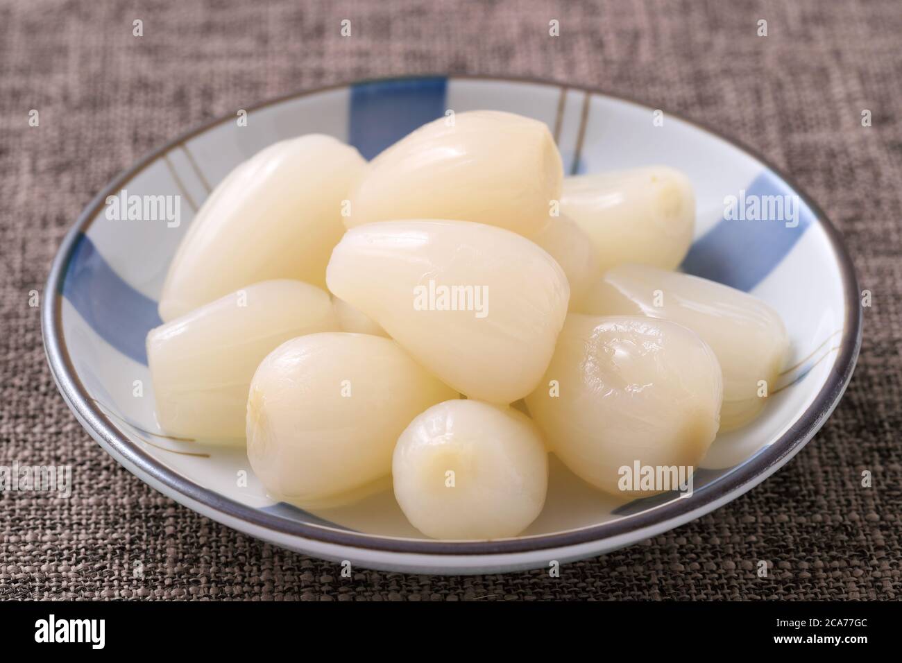 Rakkyo, Pickled Japanese leek, Pickled scallions in a dish Stock Photo