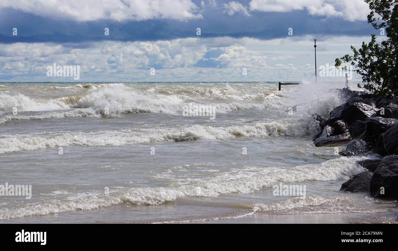 Wind advisory brings rough surf to Lake Michigan's Illinois shore on a summer day. Stock Photo