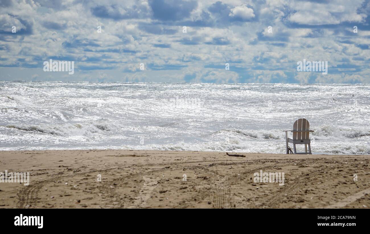 Wind advisory brings rough surf to Lake Michigan's Illinois shore on a summer day. Stock Photo
