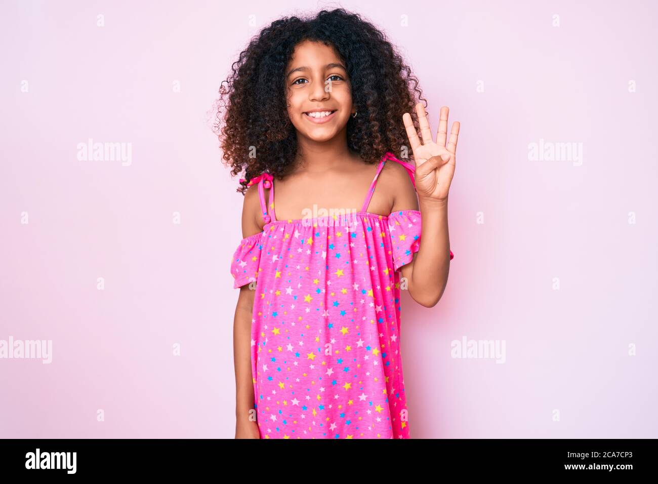 Girl showing four fingers hand hi-res stock photography and images - Alamy