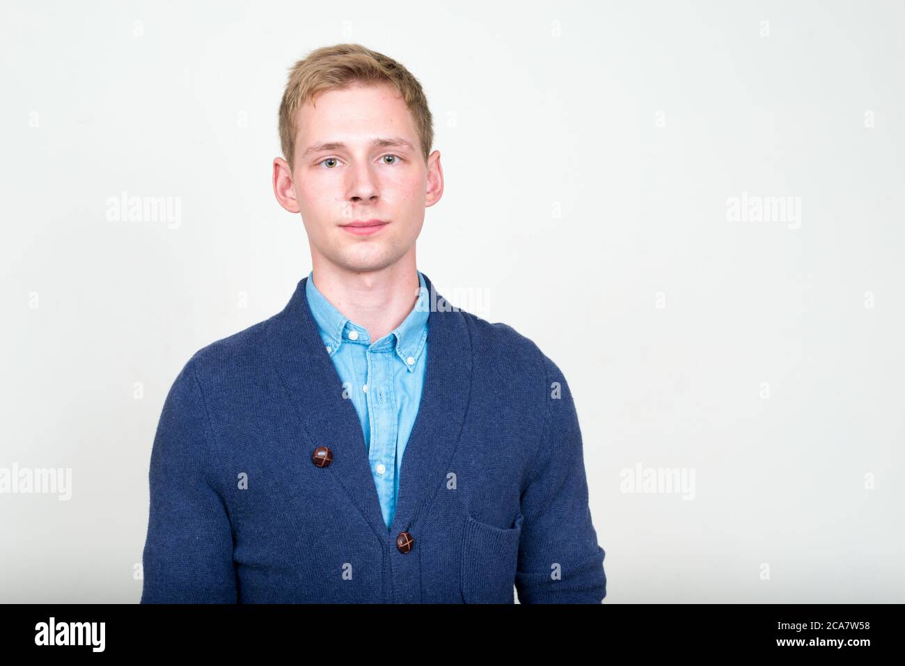 Portrait of young handsome man with blond hair Stock Photo - Alamy