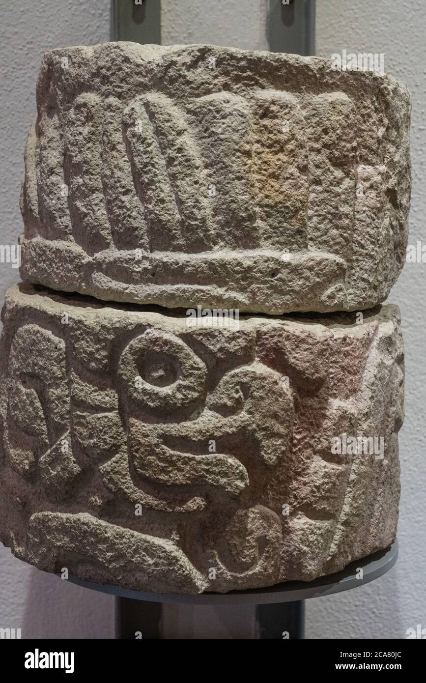 Segments of a carved stone pillar from the ruins of Monte Alban. Monte ...
