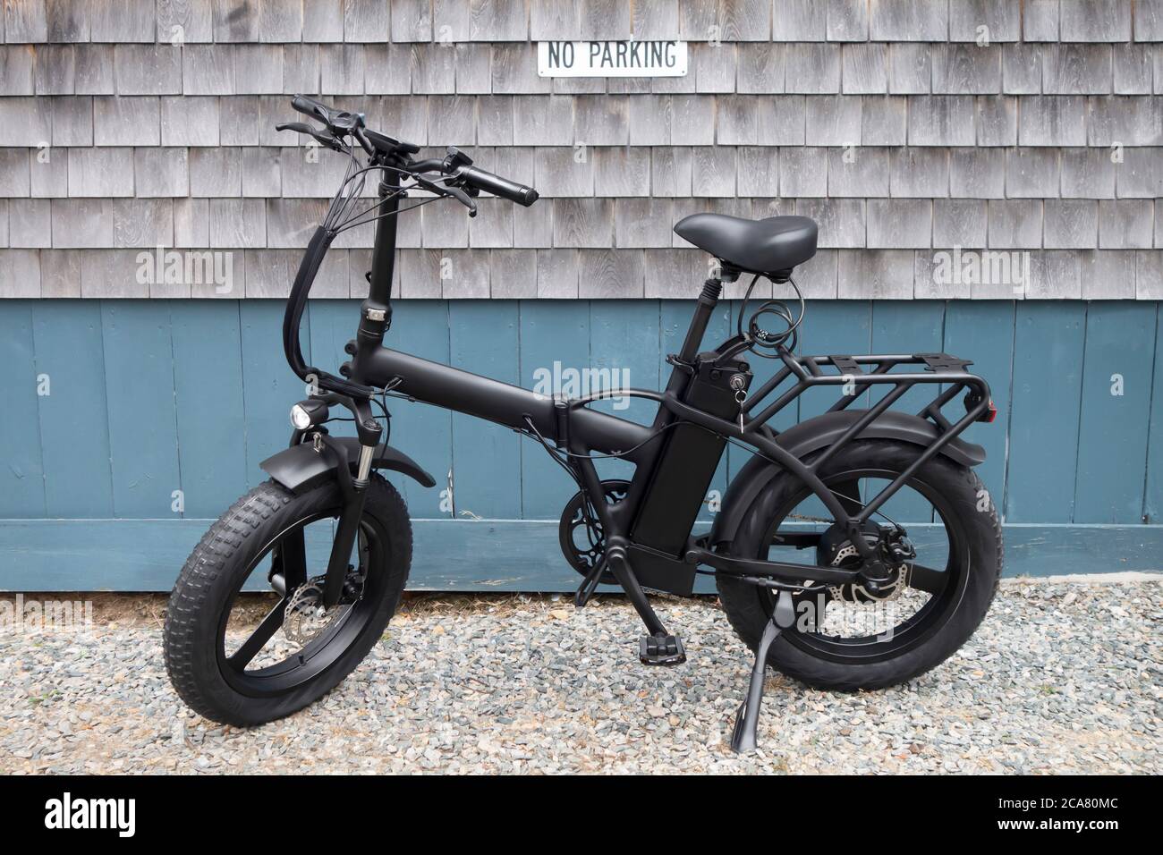 4' fat tire ebike black foldable all terrain eletric motor  bicycle Stock Photo