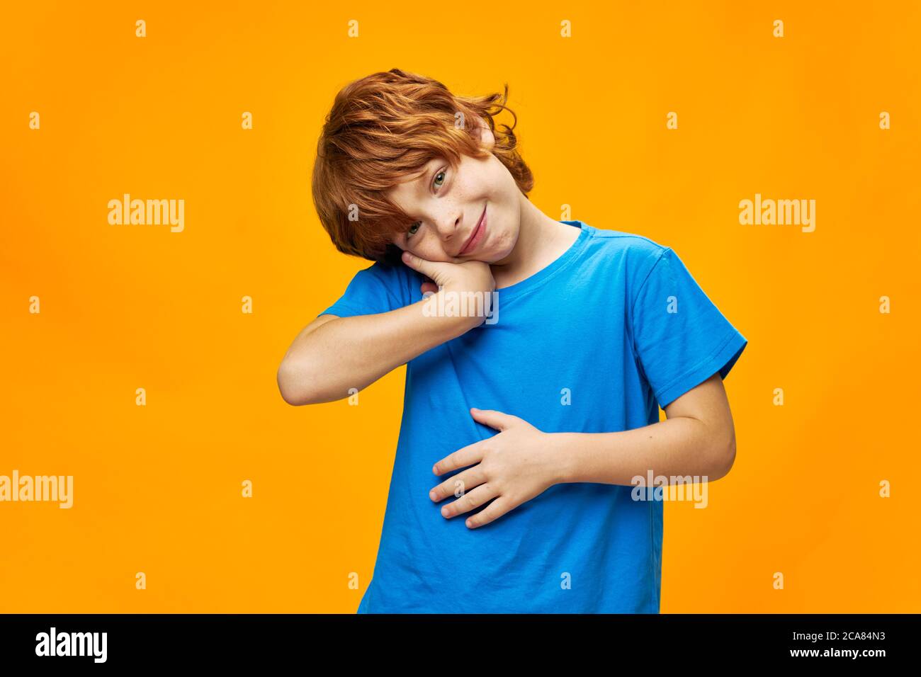 Adorable child head tilted side hires stock photography and images Alamy