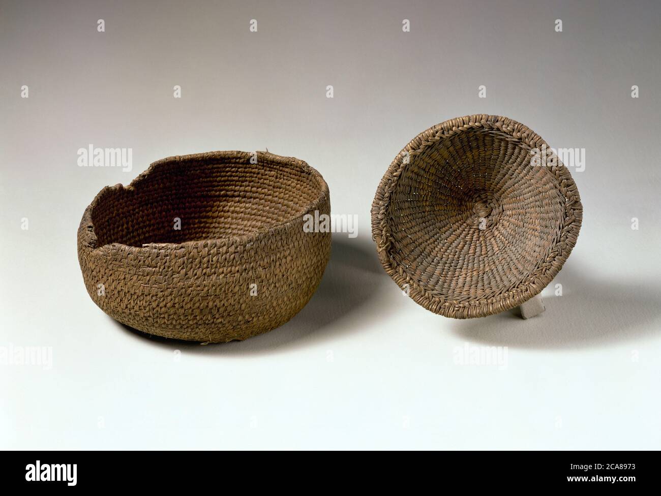 Neolithic period. Esparto basket. From Los Murcielagos Cave (Albuñol, Granada province, Andalusia, Spain). Ca.3400 BC. National Archaeological Museum. Madrid. Spain. Stock Photo