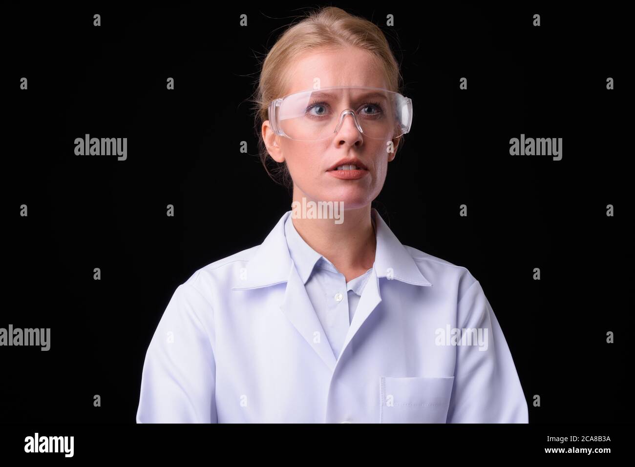 Portrait of beautiful blonde woman doctor as scientist Stock Photo - Alamy