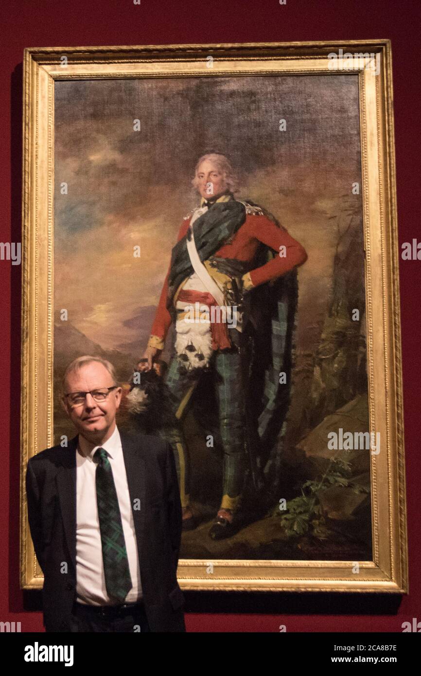 Michael Clarke, CBE, director of the Scottish National Gallery in front of a painting of Sir John Sinclair of Ulbster, 1st Baronet mid to late 1790s, Stock Photo