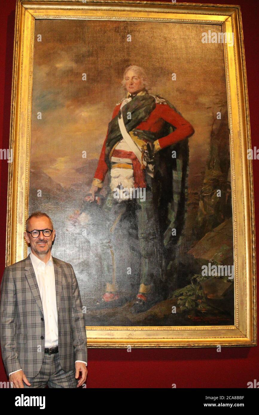 Michael Brand, director of the AGNSW in front of a painting of Sir John Sinclair of Ulbster, 1st Baronet mid to late 1790s, by Sir Henry Raeburn (Scot Stock Photo