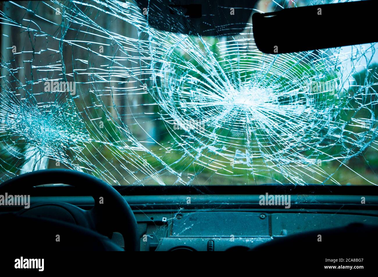 inside view of a car with a smashed windshield Stock Photo