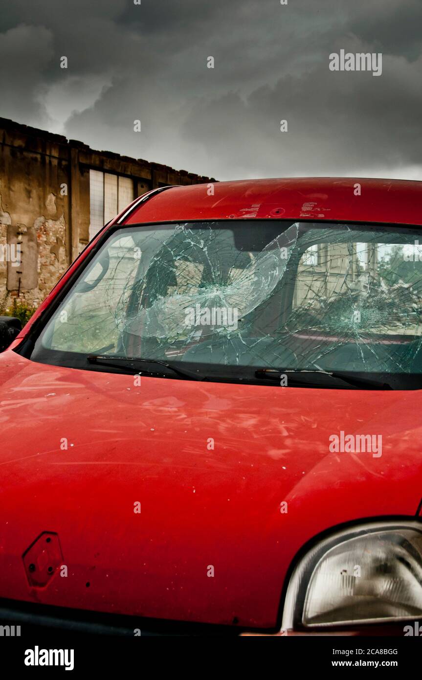 red car with a smashed windshield Stock Photo
